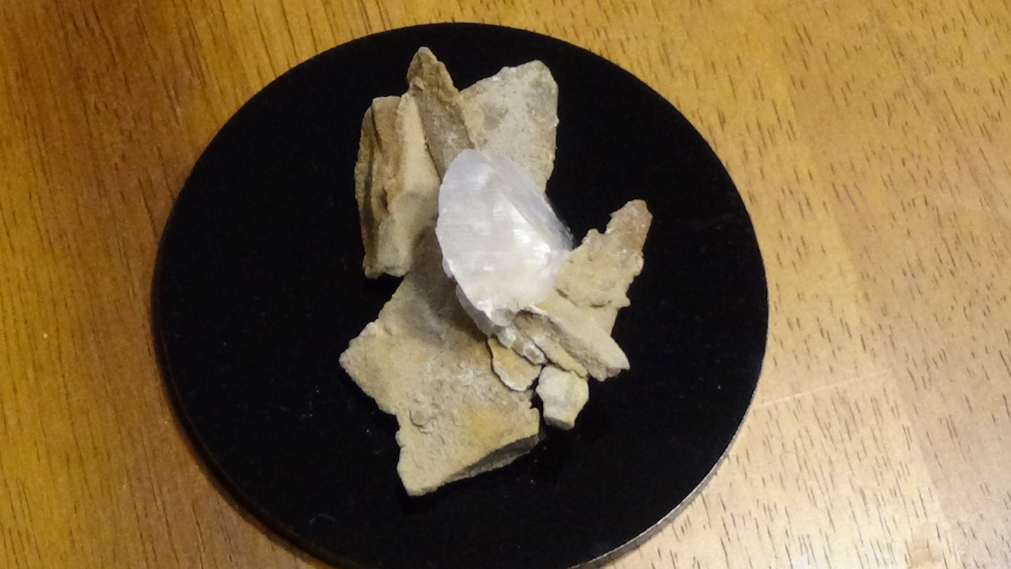 Book Cliff Calcite stalactite "Dragon Tooth" 46 g. Mounted for display.