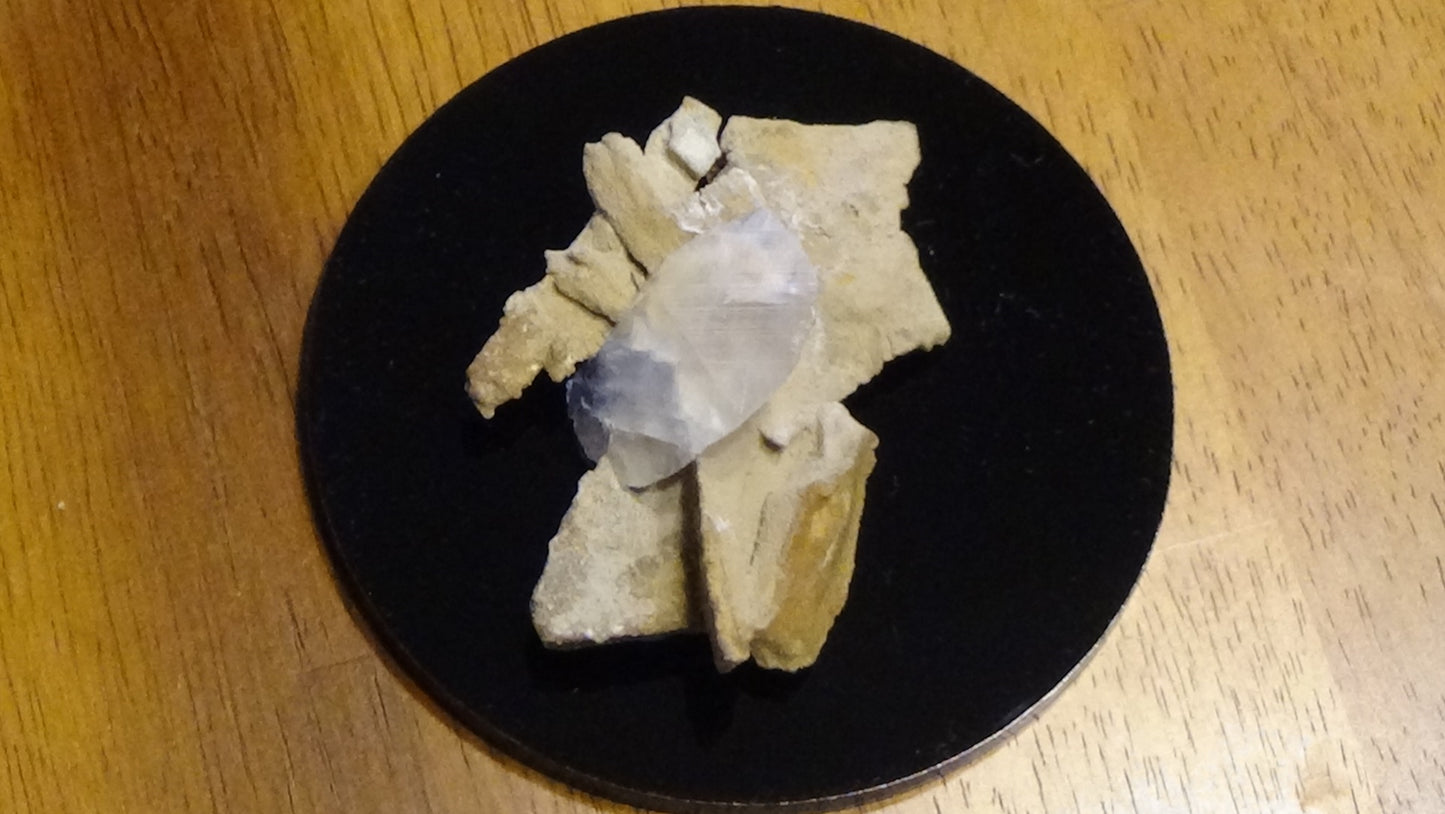 Book Cliff Calcite stalactite "Dragon Tooth" 46 g. Mounted for display.